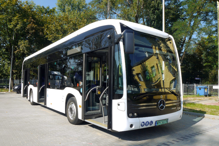 A photograph of an electric city bus from Mercedes