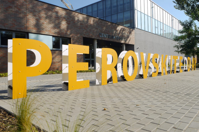 Big 3D letters on the ground saying "Perovskite Day"